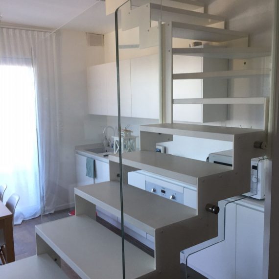 Realizzazione e progettazione zona cucina, living e scala per casa privata Celle Ligure